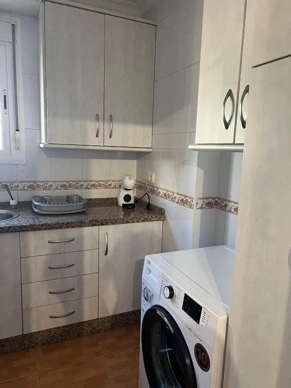 Cocina con lavadora, Apartamento Guadalora