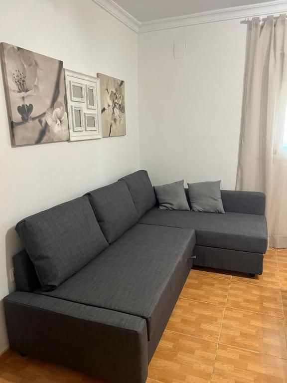 Sofá cama en el salón, Apartamento Guadalora